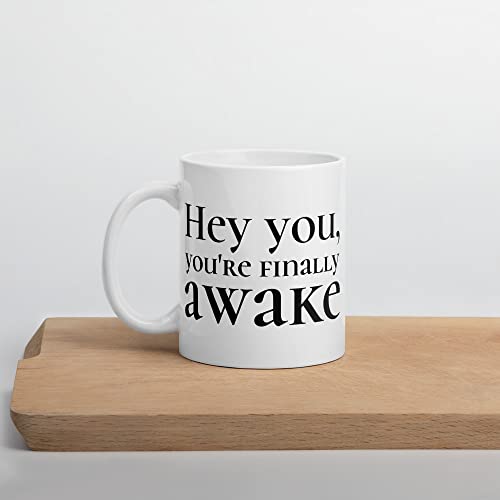 Video game Skyrim mug that says "hey you, you're finally awake".