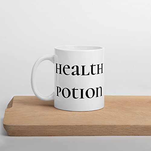 Video game mug that says "health potion".
