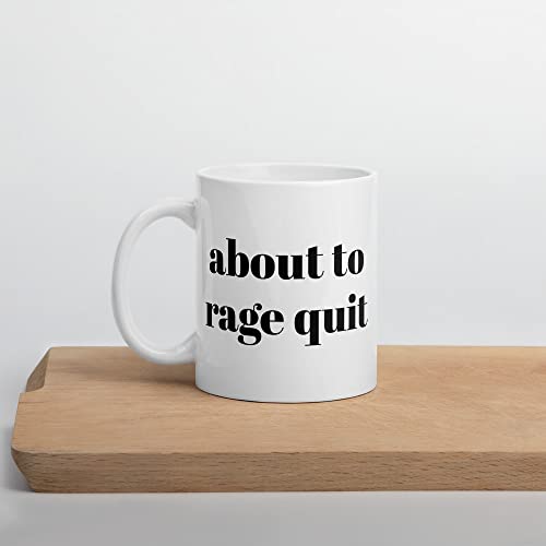 Video game mug that says "about to rage quit".